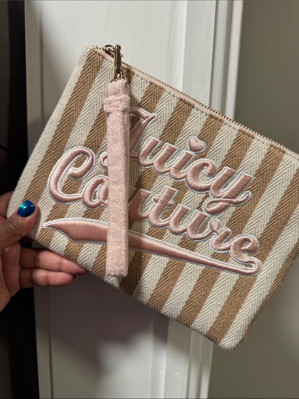 Used 1X Juicy Couture Beige and Pink Striped Embroidered Wristlet